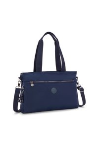 Navy blue tote bag with a smooth fabric, zippered front pocket, dual handles, and an adjustable shoulder strap. Features a logo emblem.