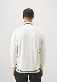 Fila JACKET BJÖRN - Chaqueta de entrenamiento - white alyssum