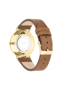 Orologio in acciaio inossidabile color oro con cassa rotonda. Cinturino in pelle marrone dotato di fori per la regolazione e chiusura con incisione del marchio.