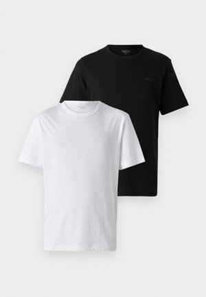 Two t-shirts displayed, one black and one white. Both feature a crew neck design and a small logo on the chest, made of cotton material.