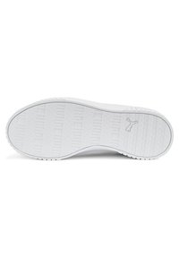 Suela de zapatilla blanca con surcos horizontales, patrones elevados y una superficie texturizada para mayor agarre. Presenta un logotipo en el centro.