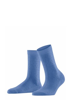 Helle blaue Baumwollsocken mit einem gerippten Bündchen, das ein strukturiertes Muster aus kleinen erhabenen Punkten auf der gesamten Oberfläche zeigt.