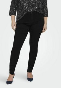 ONLY Carmakoma CARTHUNDER PUSH UP REG SK MBD NP - Jeans Skinny Fit - black