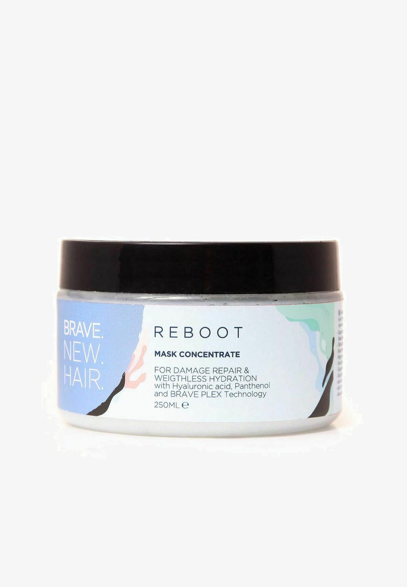 Hårmaske i et rundt, klart glas med et sort låg. Etiketten har et blåt og hvidt design med pink og grønne accenter. Indhold: 250 ml.