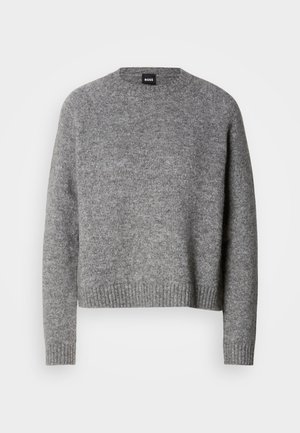 Hallhallane kootud kampsun ümmarguse kaelusega, pikkade varrukatega ja soonikkoes äärtega. Pehme tekstuur; minimalistlik disain ilma mustrite või aktsentideta.