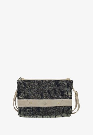 Sac bandoulière en velours noir écrasé avec sangle en daim beige et fermeture éclair, marqué "Mila Louise Paris" au centre avant.