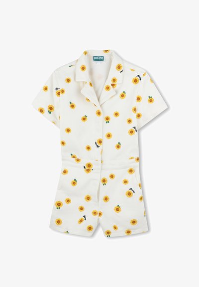 Combinaison blanche à manches courtes, ornée d'un motif de tournesols. Comprend un col, des poches et des détails brodés.