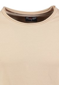 Beige Kurzarmhemd mit rundem Halsausschnitt, aus glattem Stoff; verfügt über ein Etikett mit "Key Largo, gegründet 1994."