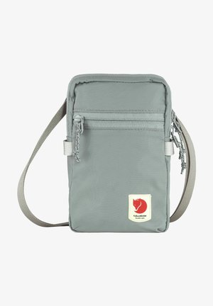 Gray fabric crossbody bag with a rectangular shape, top zipper, front pocket with zipper, and a logo patch featuring a red fox.