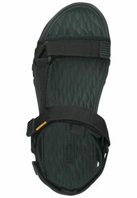 Black sandal with a textured sole, featuring adjustable nylon straps and a yellow accent. The upper is smooth with a secure fit design.