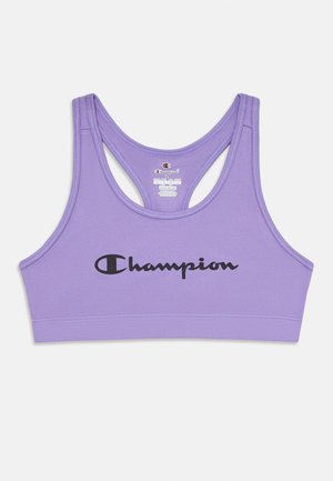 Lavendeli racerback spordibrasi musta "Champion" logo'ga keskel esiosas ja nähtav suuruse silt taga seest.