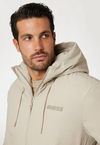 Guess REGULAR - Giacca invernale - beige