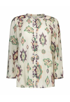 Blouse crème à manches longues avec boutonnière devant, présentant des motifs géométriques et floraux verts, violets et beiges, avec un col rond.