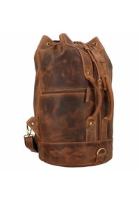 Sac à dos en cuir marron avec cordon de serrage, finition texturée, poche zippée à l'avant et accents en métal. Équipé d'une bandoulière réglable.