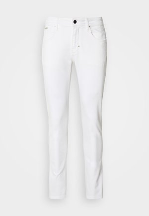 White denim jeans featuring a straight-leg design, classic five-pocket style, metal button closure, and subtle stitching details.