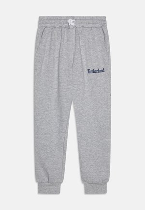 Pelēki sporta bikses, izgatavotas no kokvilnas maisījuma auduma, ar elastīgu jostasvietu un aukliņu, sānu kabatām un "Timberland" logo tumši zilā krāsā.