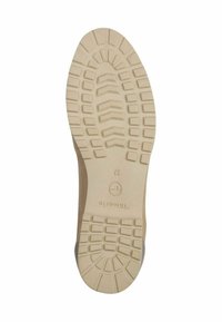 Suola di scarpa in gomma con un motivo di battistrada testurizzato. La suola è di un beige chiaro, con una leggera curvatura all'estremità delle dita e un marchio in rilievo.