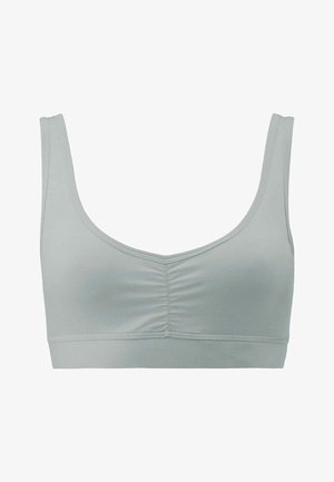 Top sportivo grigio chiaro con spalline larghe, centro anteriore arricciato e fascia elastica di supporto nella parte inferiore.