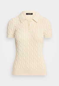 Beige pletené polo tričko s krátkým rukávem, žebrovaným límcem a lemem. Obsahuje dva knoflíčky a diskrétní logo na hrudi.