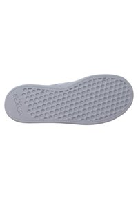 White shoe sole featuring a honeycomb pattern, with "adidas" embossed on the heel. Smooth texture and rounded edges for comfort.