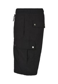 Black knee-length cargo shorts with elastic waistband, drawstring, two snap-button flap pockets, and a side slit pocket.