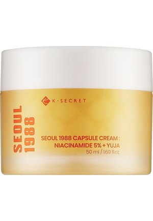 Barattolo di crema capsula K-Secret Seoul 1988 con niacinamide 5% e yuja, 50 ml, confezione gialla e bianca con testo rosso.
