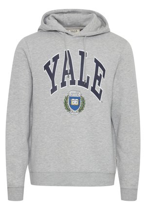 Siva dukserica s kapuljačom s natpisom "YALE" u tamnoplavoj boji i grbom sveučilišta s lovorovim granama otisnutim sprijeda.
