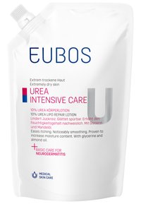EUBOS Urea Intensivpflege Lotion in einem weißen, aufrecht stehenden Beutel mit Schraubverschluss. Mit pinker und blauer Schrift; enthält 10% Urea und Mandelöl.