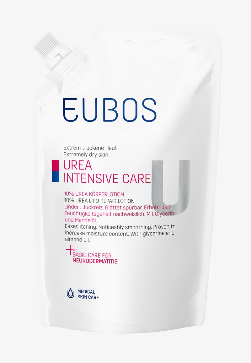 EUBOS Urea Intensivpflege Lotion in einem weißen, aufrecht stehenden Beutel mit Schraubverschluss. Mit pinker und blauer Schrift; enthält 10% Urea und Mandelöl.