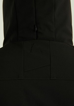 Black hooded jacket with a smooth texture, featuring a zip closure and a geometric stitched design on the back.