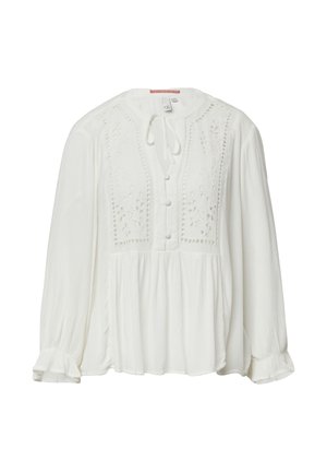 Blouse blanche à manches longues avec un col rond, des boutons à l'avant, une broderie intricate sur la poitrine et des détails de couture froncée en bas.