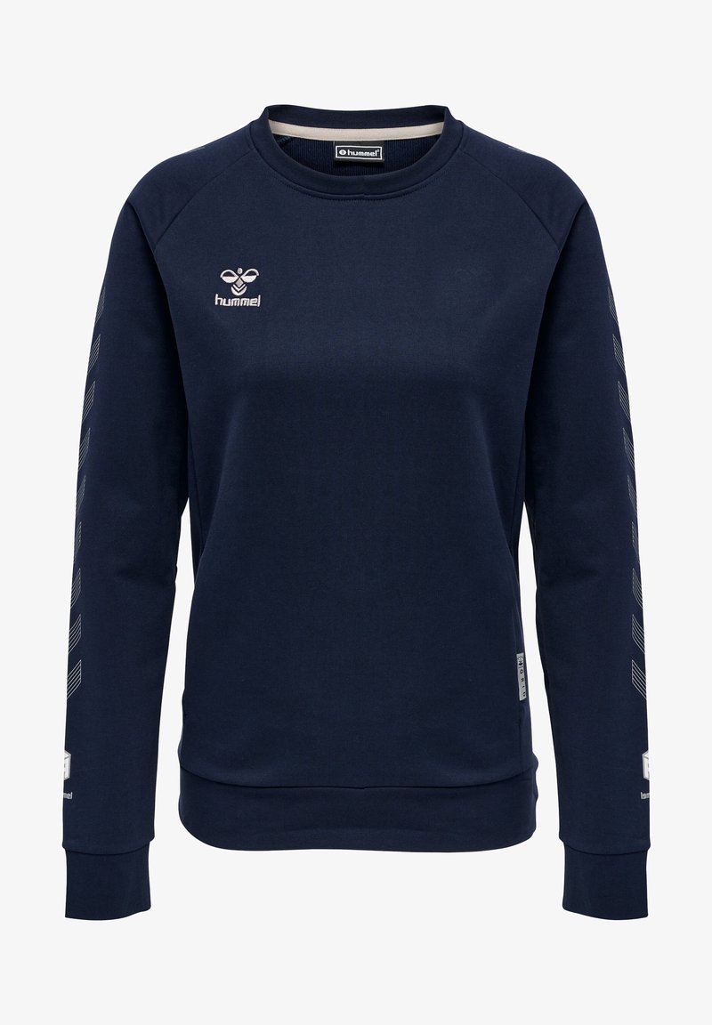 Marinblå sweatshirt med långa ärmar, rund halsringning och strukturerad tyg. Har vitt logotyp och blixtsnittmönster längs ärmarna.