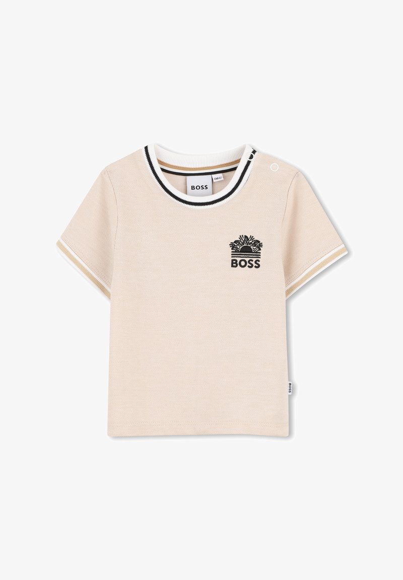 Chemise beige à manches courtes pour tout-petit avec bordure noire et blanche sur le col et les manches, arborant un logo noir "BOSS" avec un soleil et des vagues sur la poitrine.