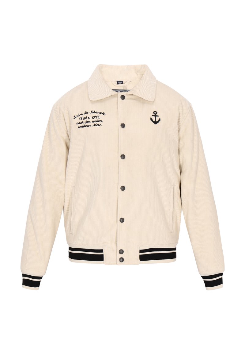 Beige corduroy jacket with black embroidery, button closure, side pockets, and contrasting black and white striped cuffs and hem.