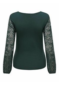 Haut vert foncé à manches longues avec un motif de dentelle florale sur les manches et un corps en tissu uni, présenté de dos.