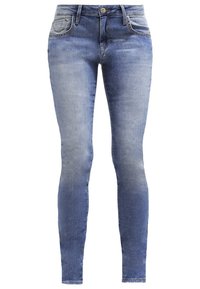 Světle modré úzké džíny z denimu, mají pět kapes, přední zapínání na knoflíky a jemné vyblednutí pro efekt opotřebení.