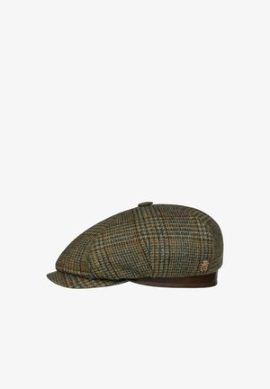 Flat tweed newsboy cap with brown, green, and gray plaid pattern and small leather trim along the base.