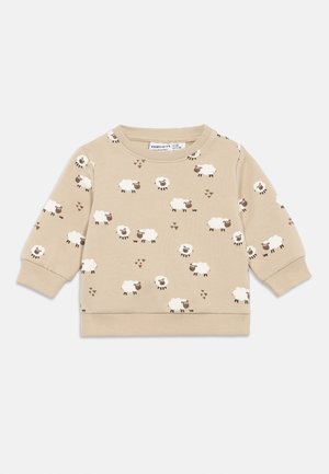 Beige langærmet babypullover med mønster af hvide og brune får samt ribstrikkede manchetter og kant, str. 6 måneder.