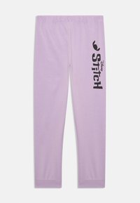 Lilla-lavendel värvi legginsid, mis on valmistatud pehmest kangast ja millel on elastne vöökoht. Küljel on must "Stitch" graafika ja Disney logo.