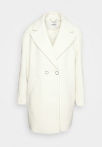 Abrigo blanco de doble botonadura hecho de tela texturizada, con grandes solapas, dos bolsillos laterales y botones plateados. Forro interior suave.