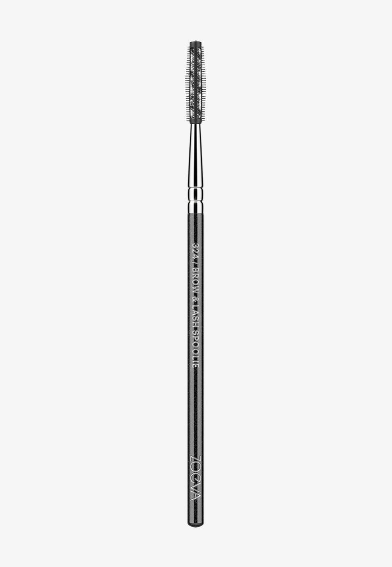 Brosse spoolie fine noire avec des poils fins, conçue pour le toilettage des sourcils et des cils, étiquetée "ZOÉVA" sur le manche.