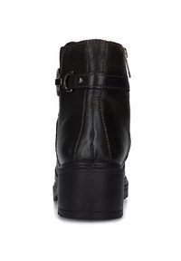 Stivale alla caviglia in pelle nera con chiusura con zip, fascia decorativa e fibbia, punta tonda e tacco spesso nero.