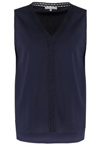 Marinblus utan ärmar med V-ringning, prydd med spetsdetaljer längs ringningen och en rak nederkant. Tillverkad av mjukt och slätt tyg.