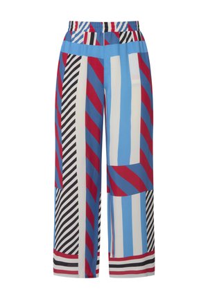 Wide-leg trousers with a mix of bold patterns in red, blue, black, and white. Made from a smooth fabric with an elastic waistband.