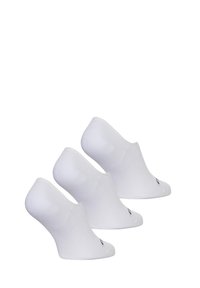 Trois paires de chaussettes blanches mi-mollet, fabriquées en tissu extensible, avec une texture côtelée et un petit logo noir près de l'orteil.