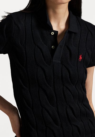 Black cable-knit polo shirt with a textured pattern, featuring a collared neckline and three buttons, accented by a small red logo.