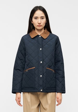 - Kurtka przejściowa