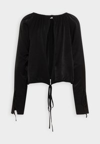 Haut court en velours noir avec manches longues, coupe ample, encolure élastique et détails à nouer aux manches et à l'ourlet. Texture lisse, design minimaliste.