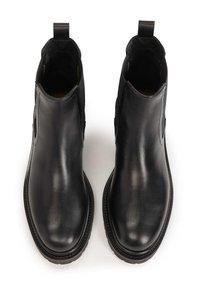 Black leather ankle boots with elastic side panels, rounded toes, and pull tabs. Smooth texture with minimal stitching details and low heel.