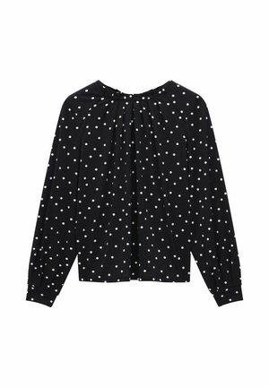 Svart långärmad blus med vita prickar, med plisserad halsringning och åtsittande cuffs. Mjukt tyg med en slät yta.